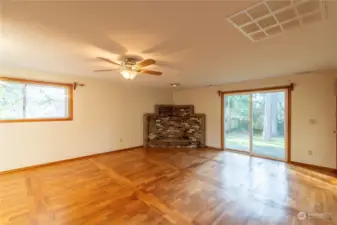 Another view of the huge family room with access through the slider to the back yard.