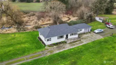 18307 small home next to large farmhouse