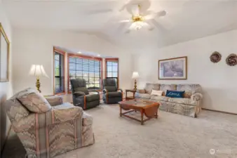 Living room bay window and ceiling fan