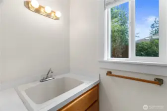Private, half bath off of laundry/mud room