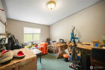 inviting office space attached to the primary bedroom with a view.