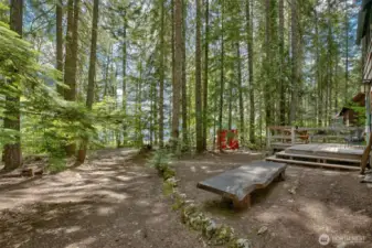 Front of Cabin with Views of Lake Beyond - Parking at Distant Left