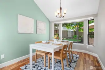*Wolf Whistle* Check out that sexy Dining Room. Dining Room overlooks the gorgeous backyard keeping you connected with the outdoors as you entertain. Vaulted ceiling, acacia wood flooring, and light surroundings make this room a favorite.