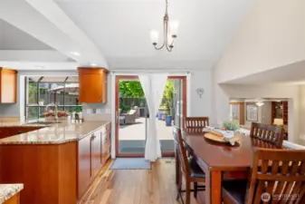 Having a quick bite or just an informal meal? Enjoy it in the nook. Centrally located allowing you to see almost the entire lower level of the home and outside.