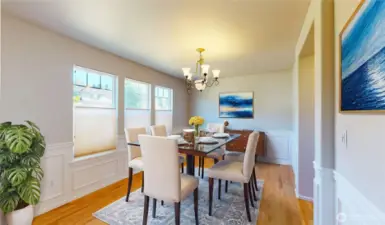 Bright and elegant formal dining room filled with natural light from large windows. Photo is virtually staged.