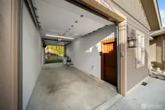 29ft deep, heated garage with dual 8ft bay doors - to store all your river toys.