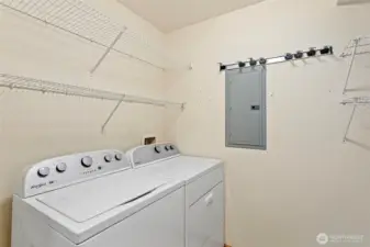 Large utility room with lots of storage. Washer and Dryer stay.