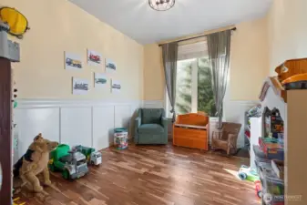 Main level office, currently used as play room.
