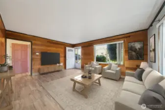 View of the living room from the kitchen. (virtually staged)