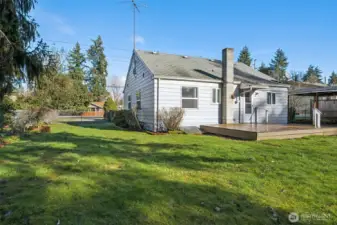 Enjoy the yard with room for parking your RV or trailer through the gate.