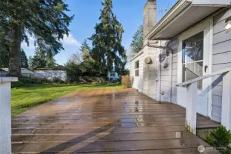 Entertain on the deck with a wonderful yard.