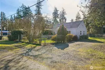 2nd driveway with gate to the back yard. Off street parking in front of the house too.