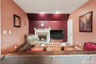 Cozy gas fireplace! Large coat closet under stairs!