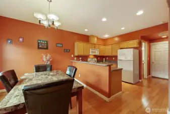 In addition to dining room, there is a large breakfast bar - perfect for busy mornings, or evening cocktails!