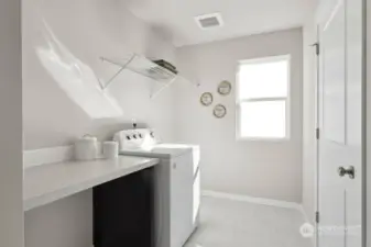 Light and bright laundry room, fall in LOVE with folding towels?