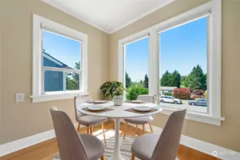 The dining room/eating area faces southwest and is bathed in natural light. *This image is virtually staged*