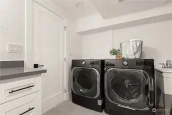 Laundry; shared with lower level bath