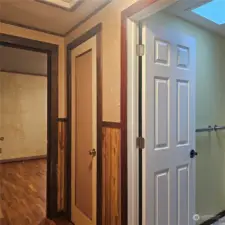 Bathroom and bedroom entrance with linen closet