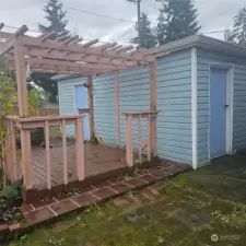 Deck off of shop. Garden or entertain.