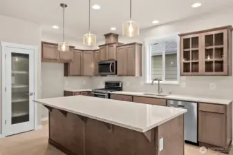 Canyon Creek Cabinets on Maple with full extension guides and soft close drawers throughout. Home under construction, photo for illustration only.