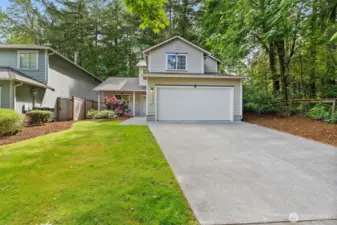 Plenty of room for parking, both inside and outside of the garage