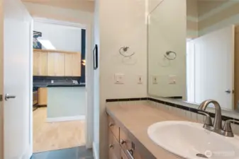 Washer/Dryer located behind bathroom door in closet.