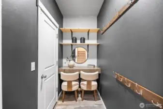 Conveniently located just off the garage, the mudroom adds everyday ease—plus, don’t miss the built-in study desk, perfect for work or homework.