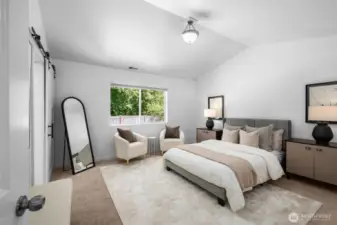 A primary suite fit for a king—or any size bedroom furniture—boasts soaring vaulted ceilings and exceptional privacy, making it a true retreat.