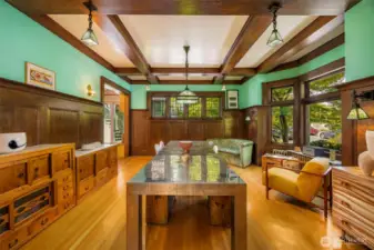 Warm wood accents and abundant natural light create an inviting space for dining and entertaining.