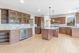 Renovated kitchen with beautiful cabinets and beverage center