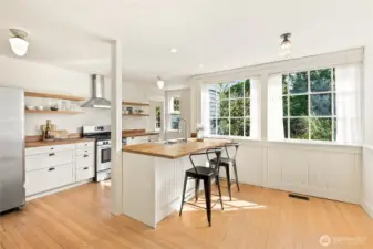 Updated Kitchen.  Stunning original windows & lighting.
