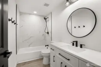 main bath new vanity, fixtures, and floors