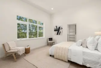 The secondary bedroom lives large, with extra space in mind for an in home