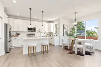 Interior photo shown is from a similar new construction home by the same builder. Fixtures, flooring, floor plan, and finishes are representative and may differ from the home currently under construction.