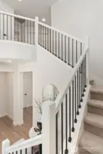 Interior photo shown is from a similar new construction home by the same builder. Fixtures, flooring, floor plan, and finishes are representative and may differ from the home currently under construction.