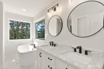 Interior photo shown is from a similar new construction home by the same builder. Fixtures, flooring, floor plan, and finishes are representative and may differ from the home currently under construction.