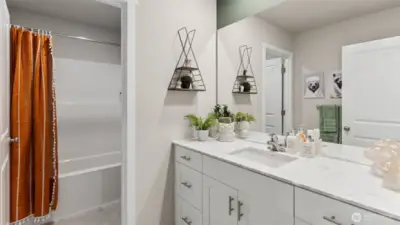 Bathroom upstairs with split door, soft close cabinet, quartz countertops. Pictures are for representational purposes only, colors and features may vary.