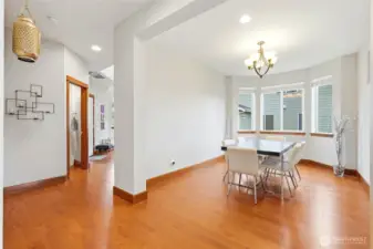 Formal dining plus a versatile bonus room/den/office on the main level