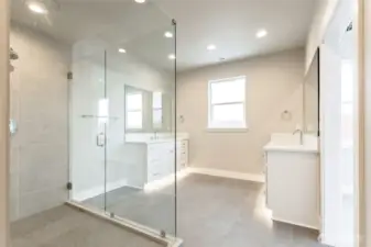 Custom tile and glass in primary shower.