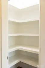 Custom shelving throughout pantry and closets of homes.