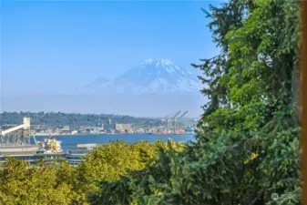 Top floor unit has breathtaking views of Mt. Rainier, Elliott Bay and downtown Seattle