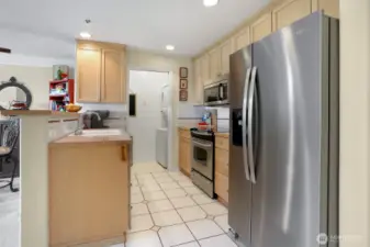 Enjoy a new fridge, washer/dryer and garbage disposal. All kitchen appliances are stainless steel.