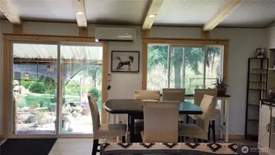 The view from the dining room looks directly out to the back patio and the Koi pond.