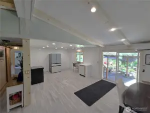 Down to the studs in the kitchen. 2x8 backer boards installed for cabinetry, custom ceiling and lighting package. Fresh paint. Ready for your dream kitchen. New Samsung Bespoke Dishwasher and Range. Samsung Bespoke Refrigerator to get you started.