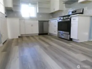 Leaving your wsher/dry in the hallway and going into the kitchen.
