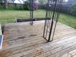 Nice wood deck right outside the kitchen door.  Big and levedl back yard to enjoy.