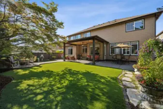 Easy & low maintenance with the lush turf yard.