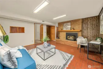 Lower level enters into a gas fireside recreation room.