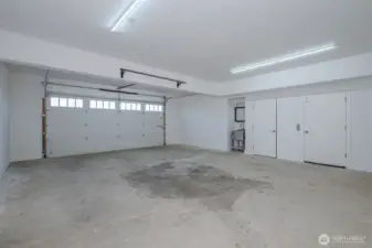 Finished 2 car garage with sink, elevator access, elevator maintenance room and large storage/mechanical room.