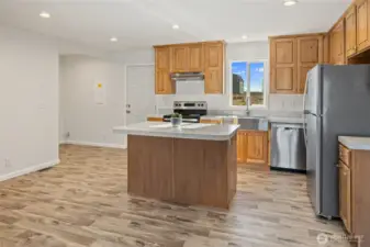 Great kitchen lay out with island good for prep and eating!